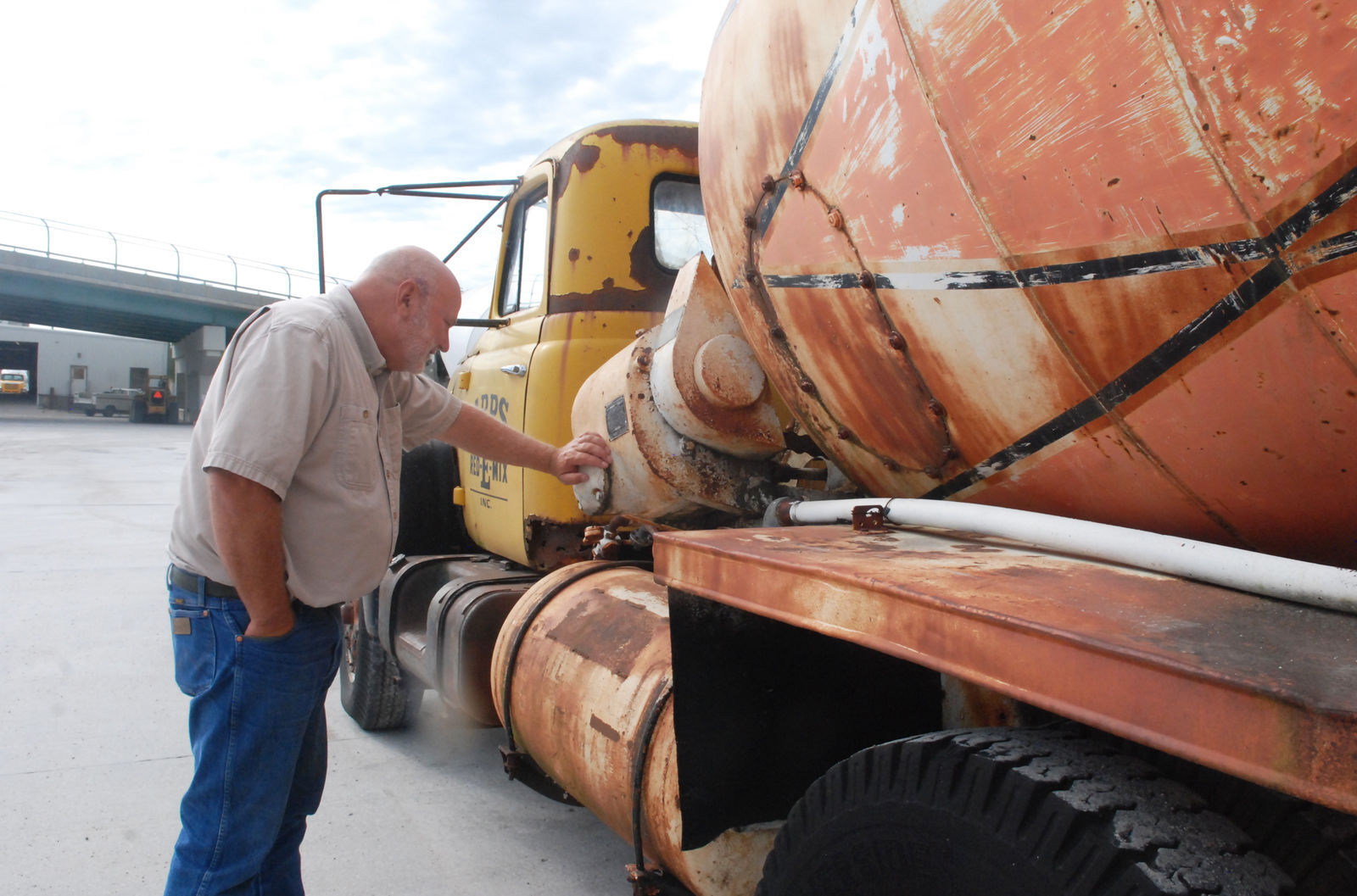 FRE Man looking at truck.jpg